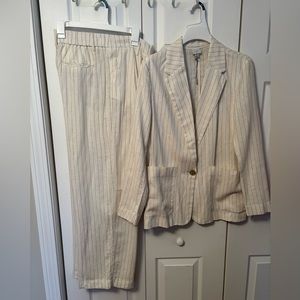 Brand new cream color linen with pinstripe suit. Jacket size M/Pants are size 6.